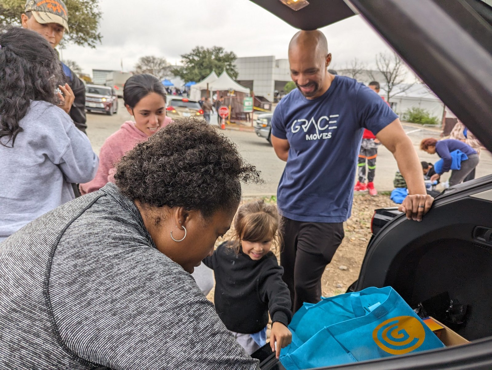 A child migrant receiving a Christmas gift.